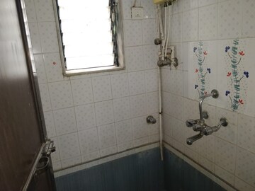 Bathroom in 2 BHK Apartment at Vile Parle East – for Rent