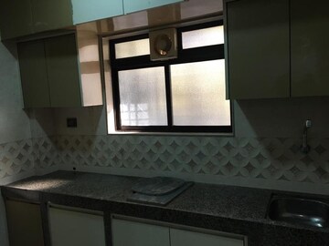 Kitchen in 3 BHK Apartment at Kalpataru Sunrise Grande, Kolshet Road – for Sale