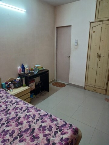Bedroom in 1 BHK Apartment at Spring Leaf 6 CHS, Kandivali East – for Rent