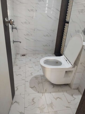 Bathroom in 1 BHK Apartment at Puranik Rumah Bali, Ghodbunder Road – for Sale