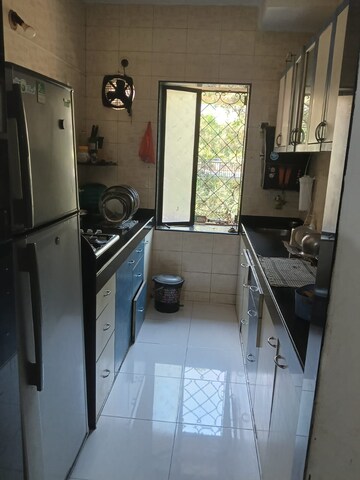 Kitchen in 2 BHK Apartment at Rail Vihar CHS, Kharghar Sector 4 – for Rent