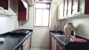 Kitchen in 2 BHK Apartment at Lodha Paradise, Majiwada – for Rent