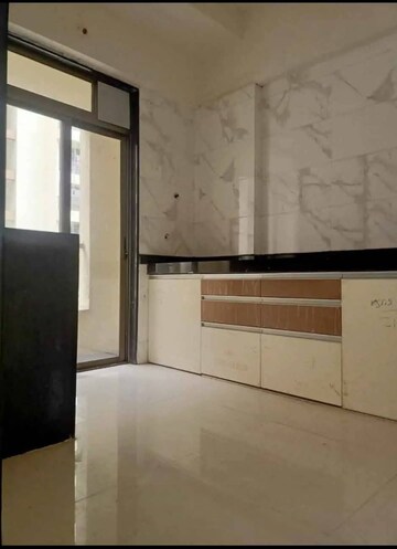 Kitchen in 2 BHK Apartment at Sunteck West World, Naigaon East – for Rent