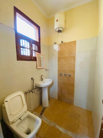Bathroom in 2 BHK Apartment at Sunny Enclave – for Rent