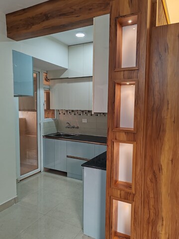 Kitchen in 2 BHK Apartment at Signature Global Orchard Avenue, Sector 93 – for Rent