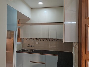 Kitchen in 2 BHK Apartment at Signature Global Orchard Avenue, Sector 93 – for Rent