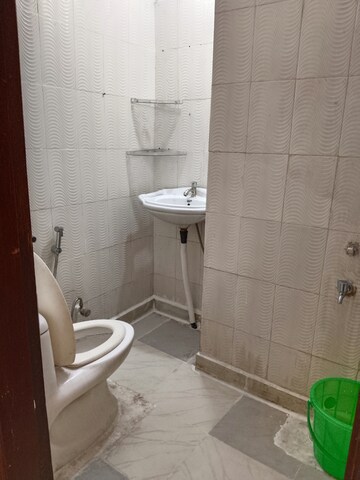 Bathroom in 2 BHK Apartment at Khirki Extension – for Rent