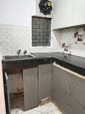 Kitchen in 2 BHK Apartment at Khirki Extension – for Rent