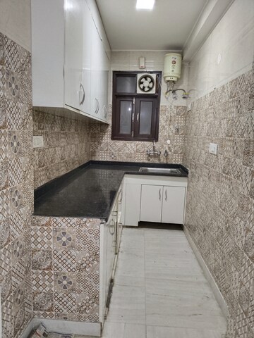 Kitchen in 1 BHK Apartment at Khirki Extension – for Rent