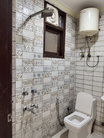 Bathroom in 2 BHK Apartment at Panchsheel Vihar – for Rent