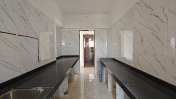 Kitchen in 2 BHK Apartment at Nav Rajhans CHS, Borivali West – for Sale