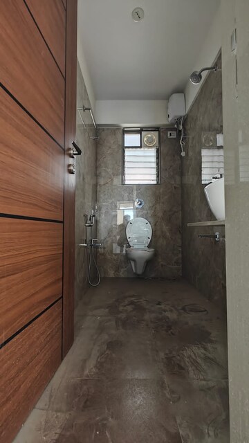 Bathroom in 2 BHK Apartment at Nav Rajhans CHS, Borivali West – for Sale