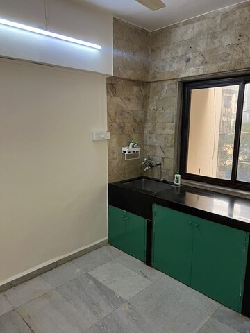 Kitchen in 1 BHK Apartment at Juhu Jivan, Juhu – for Rent