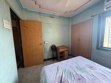 Bedroom in 1 BHK Apartment at Kavya Hill View CHS, Anand Nagar – for Rent