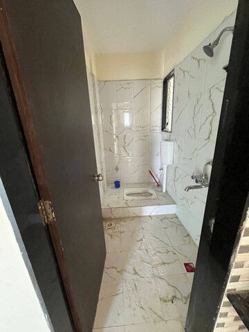 Bathroom in 2 BHK Apartment at Dhanori – for Sale