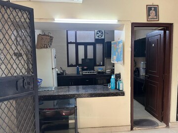 Kitchen in 2 BHK Apartment at Sarvodya Enclave – for Rent