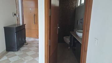 Bathroom in 4 BHK Apartment at Vasant Vihar – for Rent
