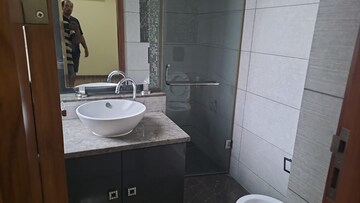 Bathroom in 4 BHK Apartment at Vasant Vihar – for Rent