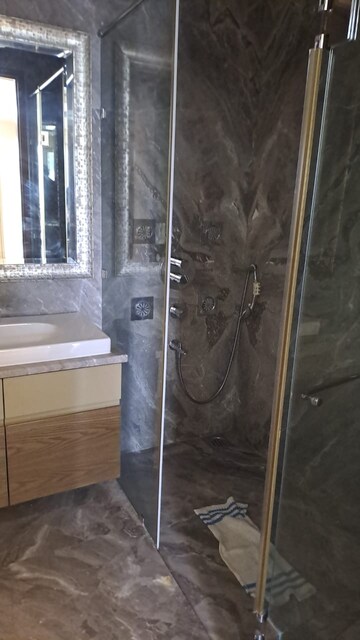 Bathroom in 4 BHK Apartment at Vasant Vihar – for Rent