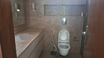 Bathroom in 4 BHK Apartment at Vasant Vihar – for Rent