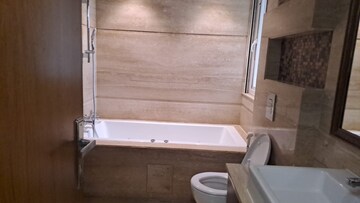 Bathroom in 4 BHK Apartment at Vasant Vihar – for Rent