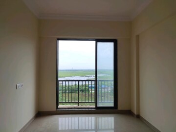 Living Room in 2 BHK Apartment at Rustomjee Avenue L1, Virar West – for Rent