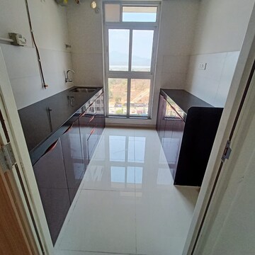 Kitchen in 1 BHK Apartment at Puranik City Reserva, Ghodbunder – for Rent