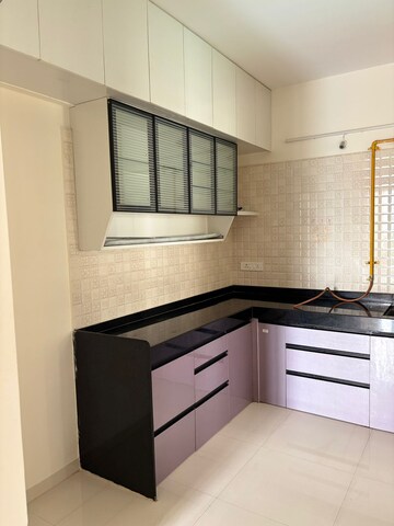Kitchen in 2 BHK Builder Floor at Gera Greensville, Kharadi – for Sale