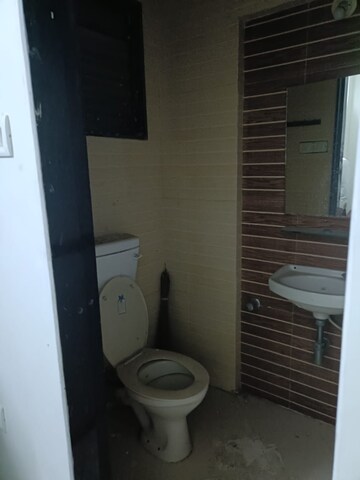 Bathroom in 2 BHK Apartment at Kopar Khairane – for Sale