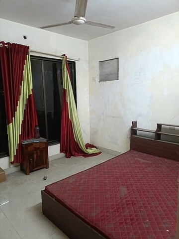 Master Bedroom in 2 BHK Apartment at Kopar Khairane – for Sale