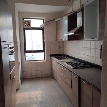 Kitchen in 3 BHK Apartment at Unitech Fresco, Sector 50 – for Rent