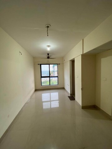 Living Room in 1 BHK Apartment at Lodha Crown Taloja Quality Homes, Dombivli East – for Rent