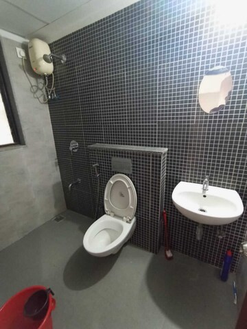 Bathroom in 1.5 BHK Apartment at Lodha Palava City, Dombivli East – for Rent