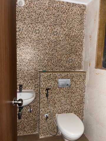 Bathroom in 1.5 BHK Apartment at Lodha Palava City, Dombivli East – for Rent