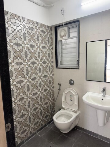 Bathroom in 2 BHK Apartment at Shree Venkatesh Graffiti Glover, Keshav Nagar – for Rent