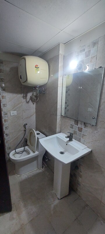 Bathroom in 2 BHK Apartment at Aims Golf Avenue I, Sector 75 – for Rent
