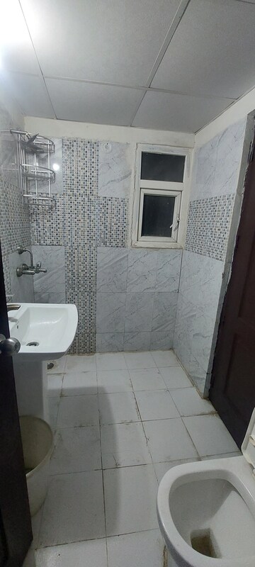 Bathroom in 2 BHK Apartment at Aims Golf Avenue I, Sector 75 – for Rent