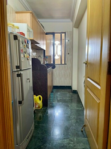 Kitchen in 2 BHK Apartment at Nav Pooja Apartment, Bandra West – for Sale