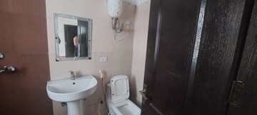 Bathroom in 3 BHK Apartment at Aims Golf Avenue II, Sector 75 – for Rent