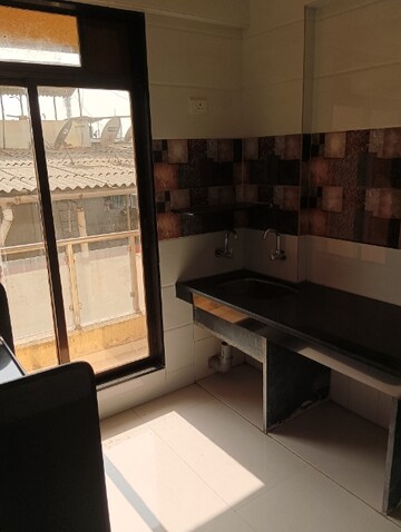 Kitchen in 2 BHK Apartment at Dombivli West – for Sale