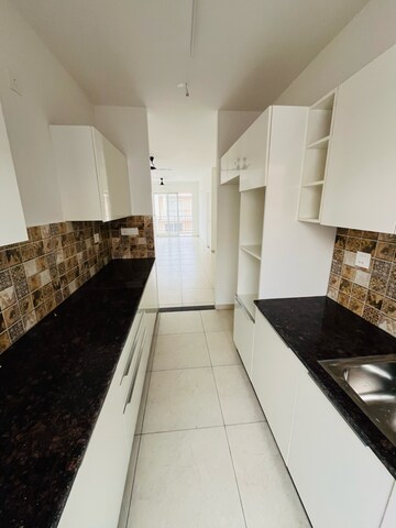 Kitchen in 3 BHK Apartment at Sushma Valencia, Nagla Road – for Rent