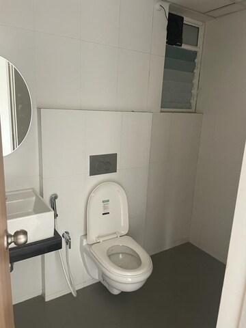 Bathroom in 1 BHK Apartment at Squarefeet Joy square, Kasarvadavali – for Rent