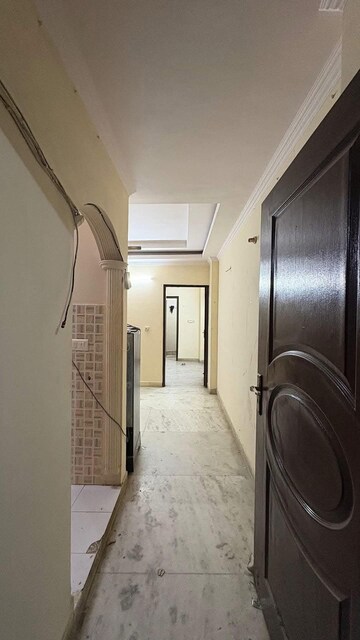 Building Lobby in 1 BHK Apartment at Freedom Fighters Enclave – for Rent
