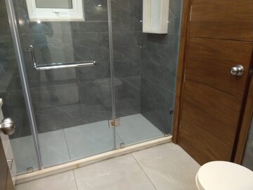 Bathroom in 4 BHK Apartment at Sarvodaya Enclave – for Rent