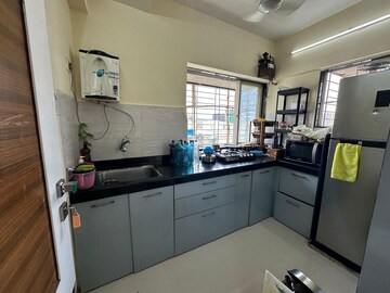 Kitchen in 1 BHK Apartment at Neev Florentina, Andheri West – for Sale