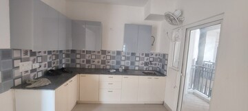 Kitchen in 3 BHK Apartment at Aims Golf Avenue I, Sector 75 – for Rent