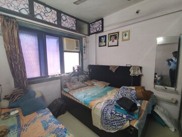 Bedroom in 2 BHK Apartment at Yashraj Park CHS, Kasarvadavali – for Sale