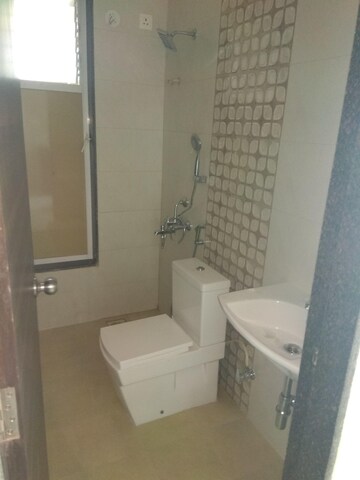 Bathroom in 1 BHK Apartment at Ajmera Yogidham Ruby, Kalyan West – for Sale