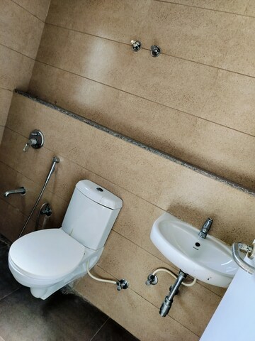 Bathroom in 2 BHK Apartment at Near Vaishno Devi Circle On Sg Highway – for Rent
