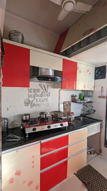 Kitchen in 2 BHK Apartment at Unique Aurum, Mira Road – for Sale